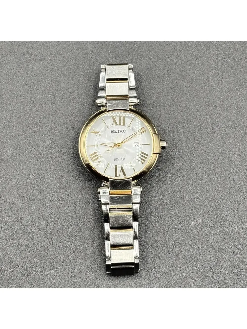 Seiko Solar Two-Tone Silver Dial Roman Numeral Ladies 32mm Watch SUT154P1